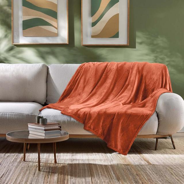 3574386097307 - Douceur D Interieur - Plaid Uni En Flanelle Terracotta