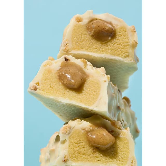 4255582815078 - Koro - Barre protéinée Deluxe noisettes - chocolat blanc